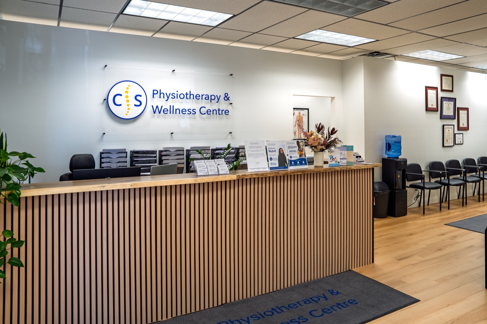 Reception desk and waiting area at C.S. Physiotherapy & Wellness Centre, Kingston